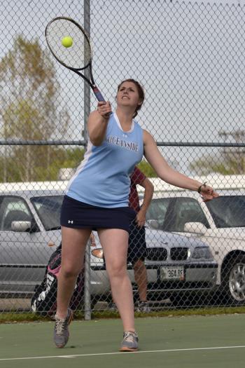 Oceanside's Lindsey Joyce serves the ball. (Photo by Ron Hawkes)