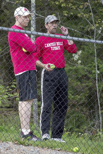 Camden Hills coach Chris Walker-Spencer, left, and assistant coach Brian Johnson watch the matches in progress. (Photo Courtesy of Dwight Pitcairn)