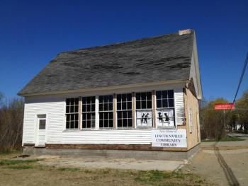 The building crew is working hard on renovating this former one-room schoolhouse and turning it into the new Lincolnville Community Library. (Photo by Sheila Polson)