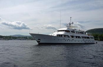 The 'Golden Compass,' a 155-foot motor yacht, sits at anchor in Camden Harbor while its crew is ashore climbing the surrounding mountains. (Photo by Steve Pixley)