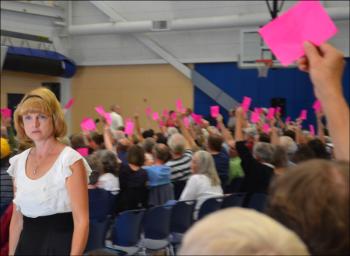 Lincolnville Administrative Assistant Karen Secotte, tallies the pink cards. (Photo by Lynda Clancy)