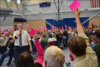 Town Administrator David Kinney counts pink cards. (Photo by Lynda Clancy)