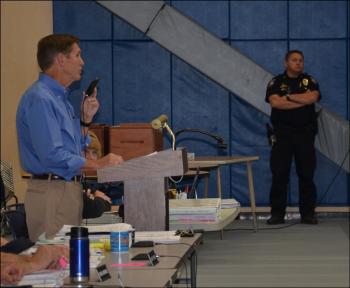 Town Meeting Moderator Rick McKittrick explains amendment to motions and how the electorate votes on them. (Photo by Lynda Clancy)