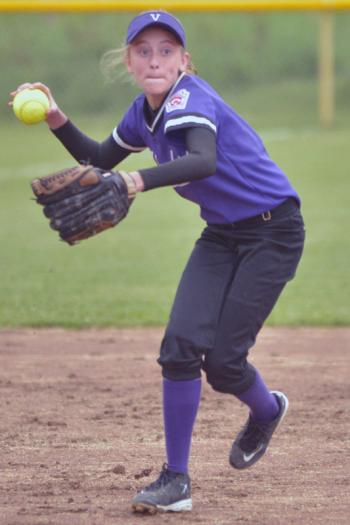 Islander Paige Dennison makes the throw to first base for the out. (Photo by Ron Hawkes)