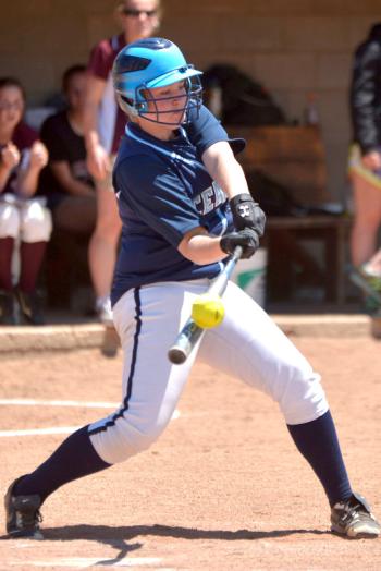 Oceanside's Kennadi Grover connects on this shot to right field that the fielder dropped allowing two runs to score giving the Mariners a 2-1 lead at the time. (Photo by Ron Hawkes)