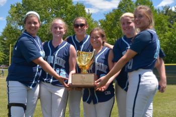 Oceanside seniors, from left, Zoey Procter, Molly Mellor, Hannah Plourde, Emma Davis, Kennadi Grover and Rachel Frye pose for family and friends with the gold glove. (Photo by Ron Hawkes)