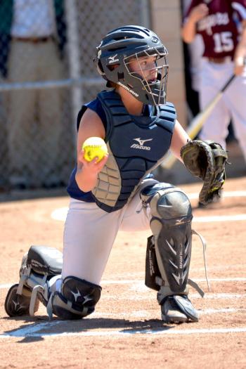 Oceanside's Ari Curtis stepped up when given the chance this spring and landed herself the starting catchers job as a freshmen. (Photo by Ron Hawkes)