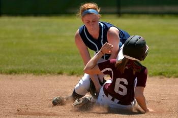 Molly Mellor puts the tag on Greely's Hannah Bufford as she trys to steal second base. (Photo by Ron Hawkes)