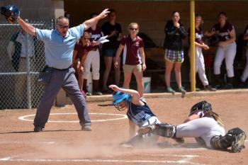 Oceanside's Abby Hersom, pinch running for Frye, slides in safe at home with the go ahead run in the top of the sixth. (Photo by Ron Hawkes)
