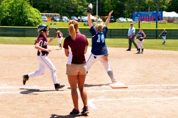 It's over, as Kennadi Grover catches the throw to retire the batter for the final out making Oceasnide the State Class B champions. (Photo by Ron Hawkes)
