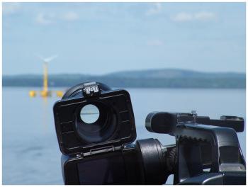 A television camera lens trained on the offshore wind turbine VolturnUS 1:8. (Photo by Ethan Andrews)