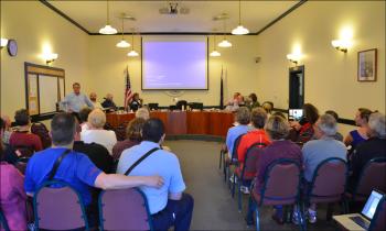 Camden citizens gather in the Washington Street meeting room June 5 to hear why a four-town review team is recommending the towns contract with North East Mobile Health Services for emergency medical services. (Photo by Lynda Clancy)