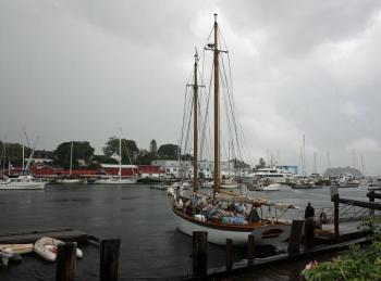 Schooner Olad backs in alongside its dock in Camden Harbor in the rain Wednesday afternoon. (Photo by Holly S. Edwards)