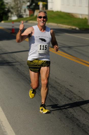 Many of the runners struggled coming up the steep hilss out of Port Clyde, but once thay got past it it was all downhill. (Photo by Ron Hawkes)