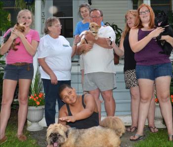 Desiree Leary, with her dog, Twiggy; Jeannette Frost, Sharon Corbett, Frank Long, Denise and Emylee Leary, with her dog, Rosie; and Gavyn Tower, with Barney. Everyone, including the dogs, were looking for Skippy. (Photo by Lynda Clancy)