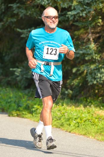Many of the runners struggled coming up the steep hilss out of Port Clyde, but once thay got past it it was all downhill. (Photo by Ron Hawkes)