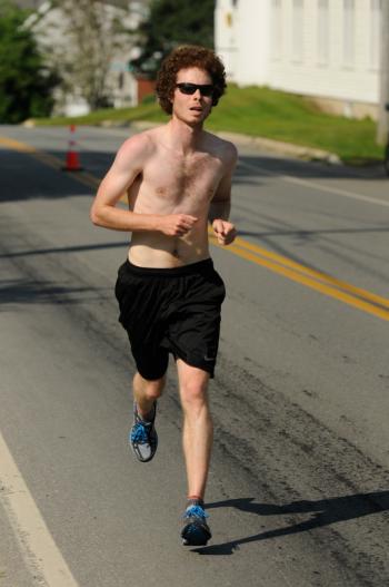 Many of the runners struggled coming up the steep hilss out of Port Clyde, but once thay got past it it was all downhill. (Photo by Ron Hawkes)