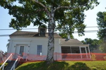 An old home, built sometime in the early 19th-Century, was torn down July 17 in Rockport Village to make way for open space. (Photo by Lynda Clancy)