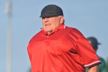 KLW umpire Dennis Wooster has been umpiring games locally for over 40 years and is still going strong. (Photo by Ron Hawkes)