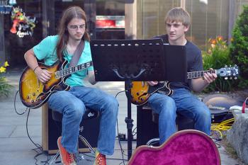 Cole Barbour, right, and Aaron Clarke played some nice jazz guitar in front of the Key Bank on Main Street in Rockland Wednesday night as part of Music on Main, presented by Rockland Main Street Inc. (Photo by Ron Hawkes)