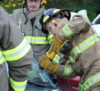 A sawsall makes quick and clean work of a windshield, allowing it to be pulled away in a solid piece. (Photo by Holly S. Edwards)