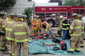 Reviewing equipment and other details before live extrication equipment training for Camden firefighters Aug. 3. (Courtesy Camden Fire Dept.)