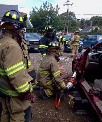 Camden firefighters train on extrication equipment Aug. 3 on donated vehicles at Camden Exxon. (Courtesy Camden Fire Dept.)