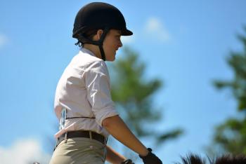 Katherine Orne warming up for a competition at the Stonewall Stables in Nobleboro Saturday. (Photo by Ron Hawkes)