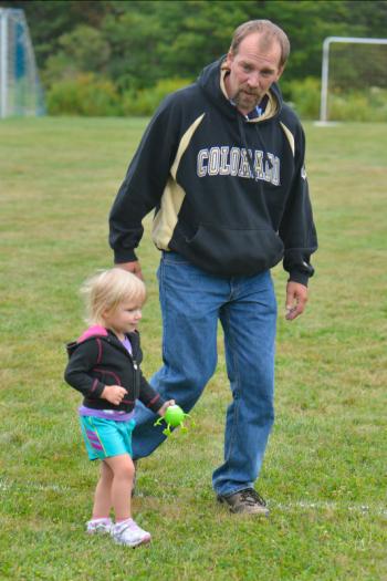 Leroy Harrington and his beautiful granddaughter. (Photo by Ron Hawkes)