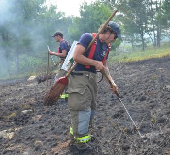 Levi Rollins, Rockport firefighter, was among the first on the scene, arriving there with the West Rockport truck. (Photo by Lynda Clancy)