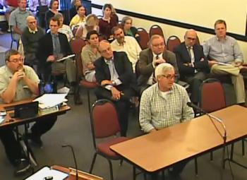 Michael Thompson, who has been manager of the Fox Hill property for several years, endorses the project. Behind him are Steve Wilson, Camden's planner and code enforcement officer; Ton Rodman, Philip Levendusky, Paul Gibbons and Bill Lane, of Gartley and Dorsky, Rockport-based engineers.