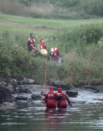 Getting the last rescuer and 'victim' out of the river. (Photo by Holly S. Edwards)
