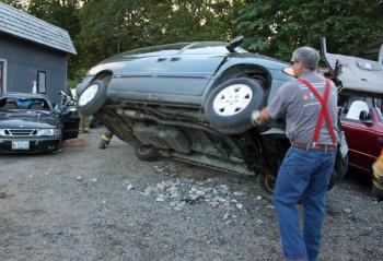 A van is rolled back onto its wheels for further training work. (Photo by Holly S. Edwards)