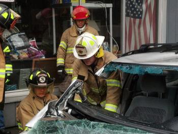 Camden firefighters training on its new extrication equipment at Camden Exxon Aug. 3. (Courtesy Camdent Fire Dept.)