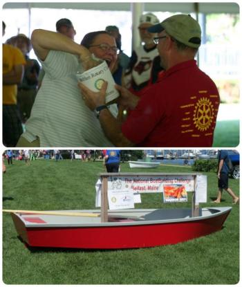 Belfast Area Rotary Club raffles a handmade boat, though winner Lars Carlson isn't in the crowd.