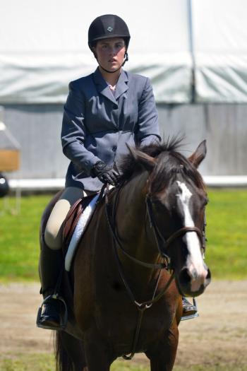 Katherine Orne riding in a competition at the Stonewall Stables in Nobleboro Saturday. (Photo by Ron Hawkes)