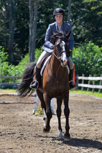Katherine Orne riding in a competition at the Stonewall Stables in Nobleboro Saturday. (Photo by Ron Hawkes)