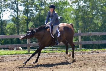 Katherine Orne riding in a competition at the Stonewall Stables in Nobleboro Saturday. (Photo by Ron Hawkes)