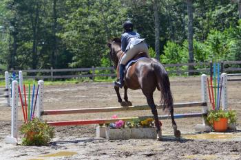 Katherine Orne riding in a competition at the Stonewall Stables in Nobleboro Saturday. (Photo by Ron Hawkes)