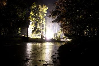 Surges of power coming into this downed transformer could be heard and felt on Park Street Wednesday night minutes after the worst of the storm passed through. (Photo by Holly S. Edwards)