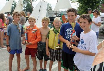Winners of this year’s Build-a-Boat contest at the Camden Windjammer Festival included the boat teams from Hornet (first to finish with both crew under 16), Catch of the Day (first), Narwhal (people’s choice) and Stern Paddle Wheeler (first to sink, team not pictured). (Photo by Holly S. Edwards)
