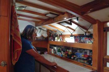 Karin Lott looks over her larder prior to making the 4-mile round trip to the supermarket. (Photo: Shlomit Auciello)