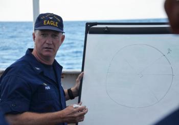 Captain Wes Pulver teaches navigation aboard the Eagle. (Photo by Lynda Clancy)