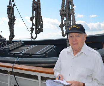 Capt. Red Shannon, a longtime member of the U.S. Coast Guard and worldwide sailor, was aboard the Eagle. He was stationed in Rockland twice, and calls Penobscot Bay “God’s Country.” (Photo by Lynda Clancy)