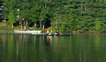 The three rowers, practicing earlier this season. (Photo courtesy of Fred Weismiller)