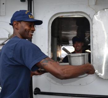 Thomas Palmer and Ian Johns, kitchen duty, Sept. 10. (Photo by Lynda Clancy)