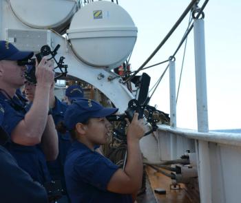 Learning to use the sextant. (Photo by Lynda Clancy)
