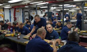 Mealtime on the mess deck. (Photo by Lynda Clancy)