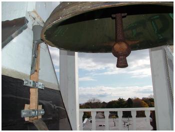 A new, larger, electromagnetic bell strike for the church’s Revere bell. (Photo by Ethan Andrews)