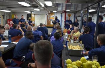 Weather briefing on the mess deck, Sept. 12.